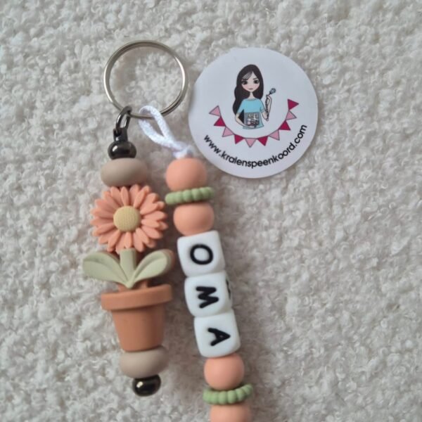 Sleutelhanger/ tashanger mama/oma Daisy peach