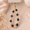Telefoonkoord zwart/goud Telefoonkoord zwart/goud